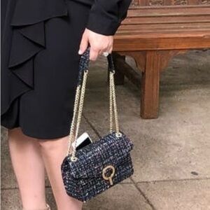 Chic Black Tweed Handbag with Gold Accents